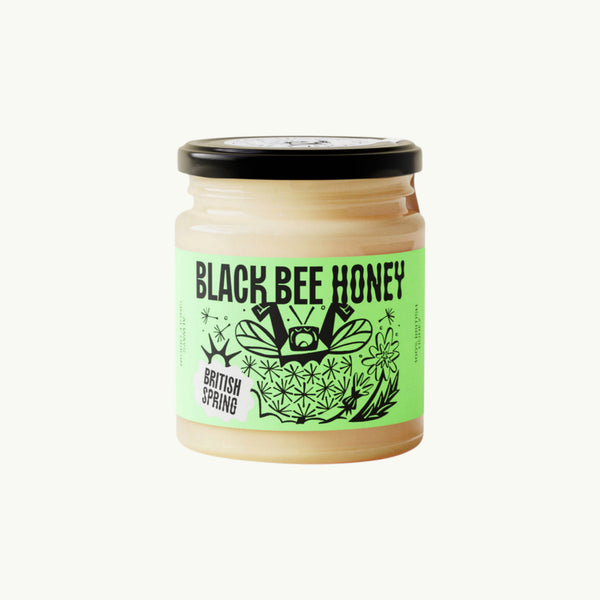 BRiMM Black Bee Honey raw British spring soft-set honey in a glass jar with a light green illustrated label