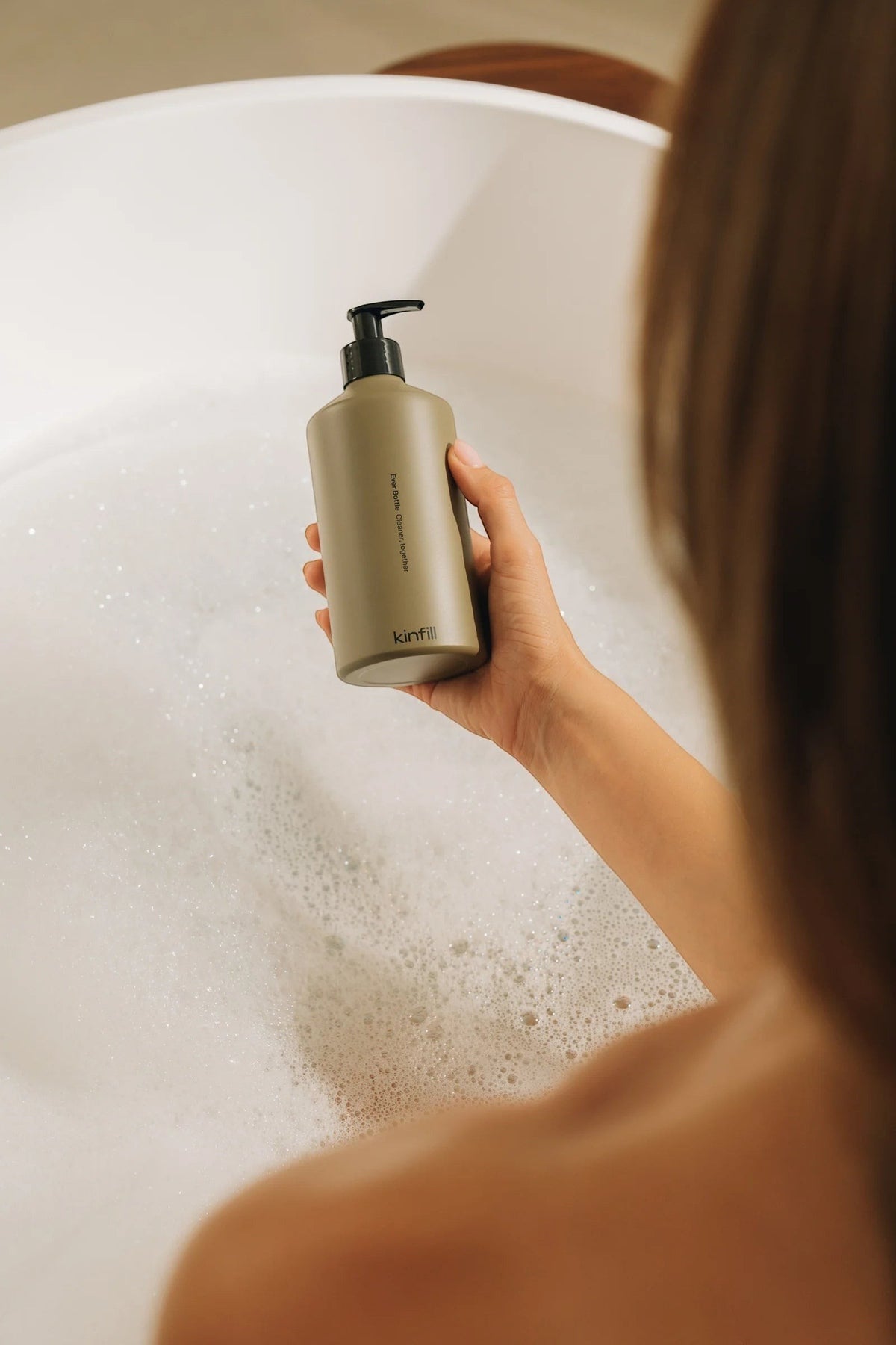 Kinfill Body Wash Refill Pouch - Santal & Cedar, in a lifestyle setting.