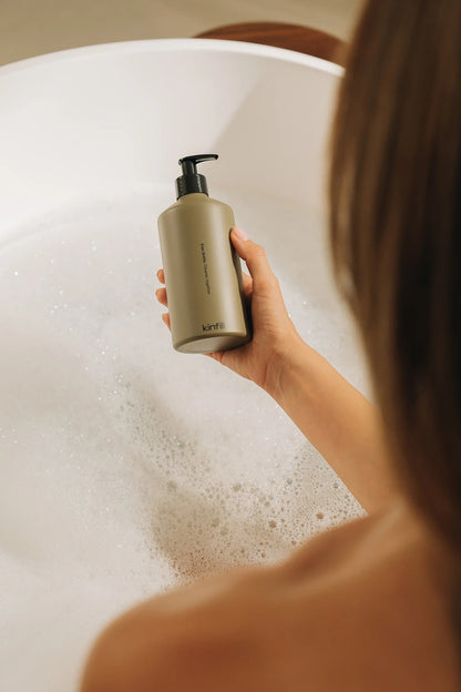 Kinfill Body Wash Refill Pouch - Santal & Cedar, in a lifestyle setting.