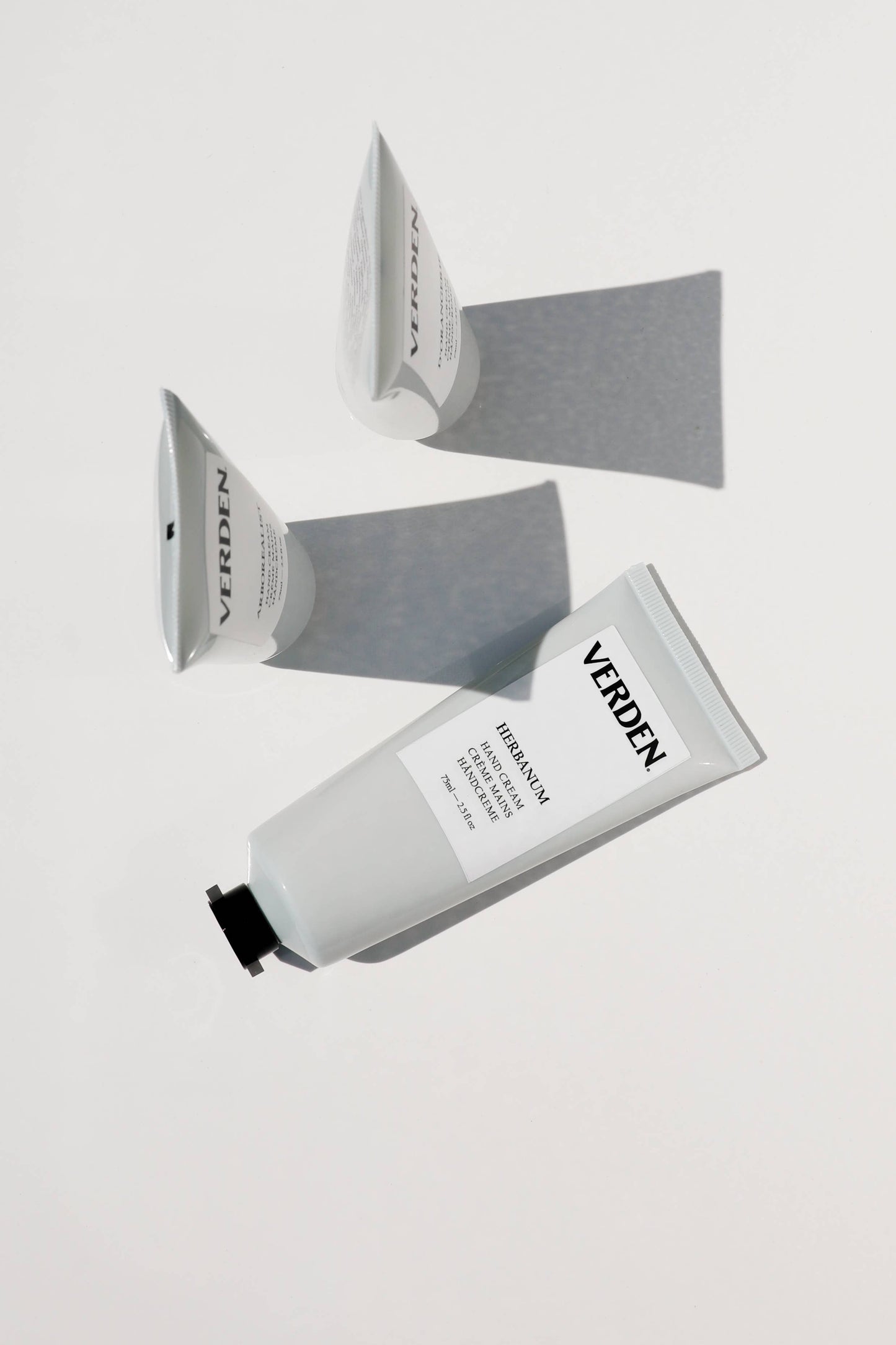 Verden Herbanum Hand Cream, in a lifestyle setting.