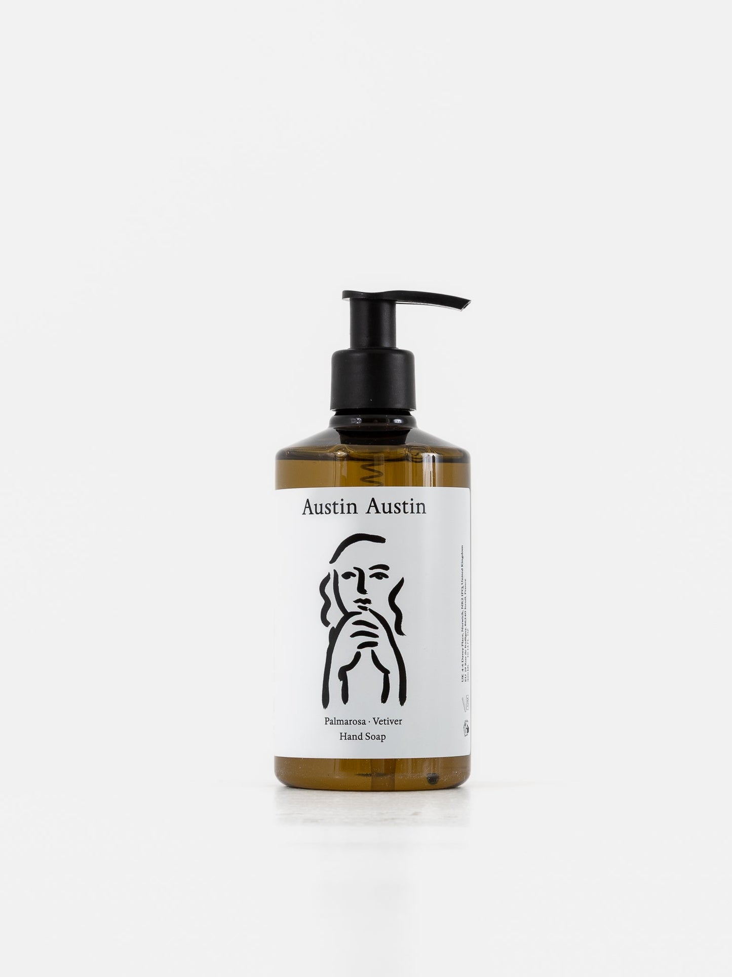 Austin Austin Palmarosa and Vetiver Hand Soap 300ml amber bottle with black pump, white label showing Christian Newby Indian ink artwork, photographed front-on against a clean white background