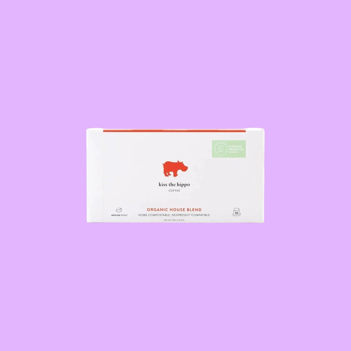 Kiss the Hippo organic house blend coffee pods in a white box with red logo on a light background