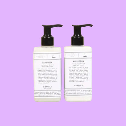 Norfolk Natural Living Coastal Walks hand wash and lotion set in white pump bottles with botanical labels for gentle hand care.