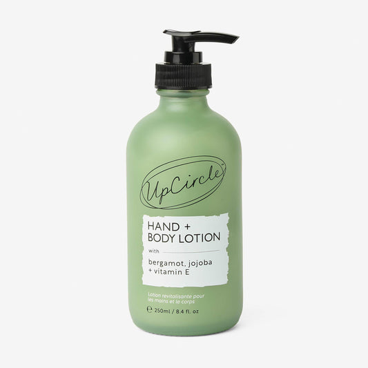 UpCircle Hand and Body Lotion with Bergamot and Vitamin E 250ml, natural vegan body lotion in a frosted green glass pump bottle