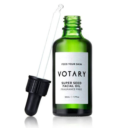 Votary Super Seed Facial Oil in a green glass bottle with a dropper, designed for sensitive skin.