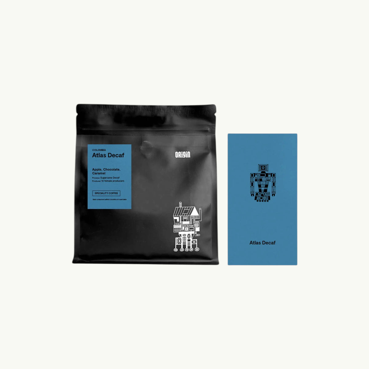 Origin Coffee Atlas Decaf whole bean coffee in a black pouch with a blue information card featuring robot graphic design