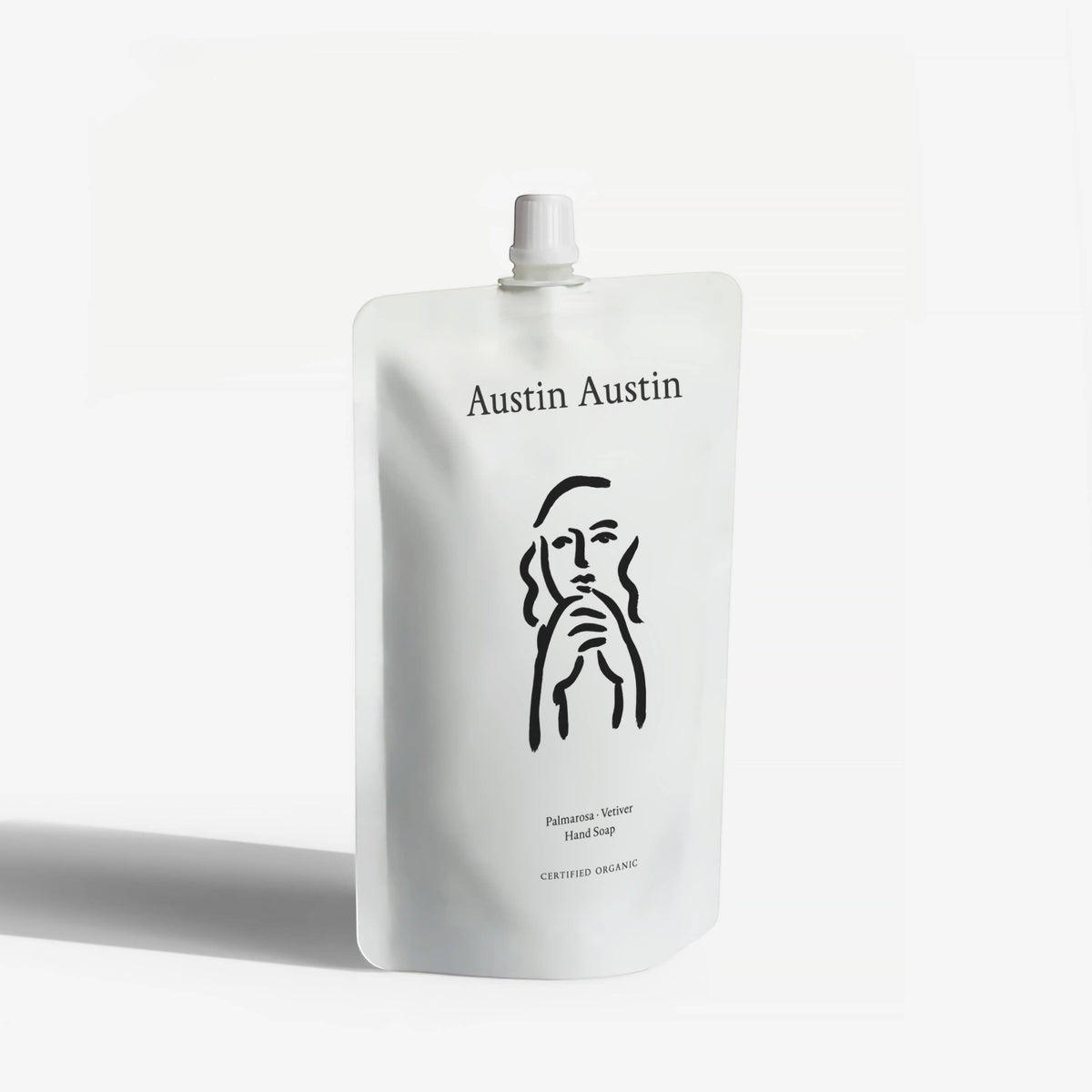 Austin Austin Palmarosa and Vetiver organic hand soap refill pouch in white packaging with minimalist black line art illustration