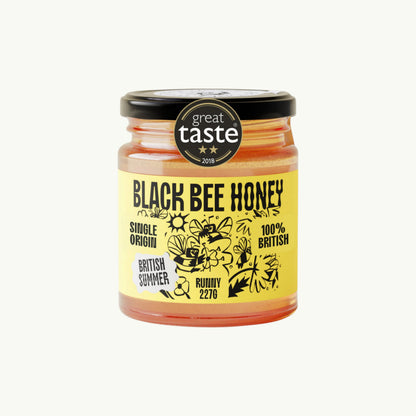 BRiMM Black Bee Honey jar of raw British runny summer wildflower honey with a Great Taste award label
