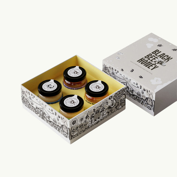 BRiMM Four Seasons mini honey gift box featuring four 42g jars of British single-origin honey in an illustrated box.