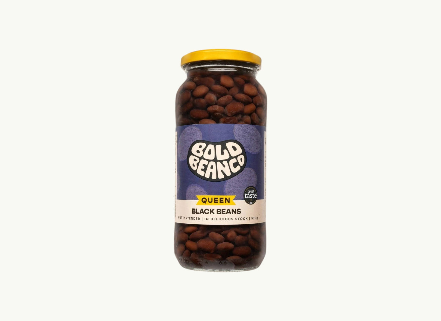 Bold Bean Co Queen Black Beans in a 570g glass jar with a yellow lid and purple label featuring earthy, glossy beans.