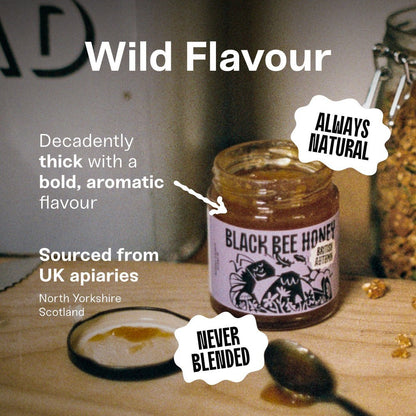 Black Bee Honey jar of dark, thick Autumn honey from Black Bee Honey, featuring illustrated label and natural ingredients.