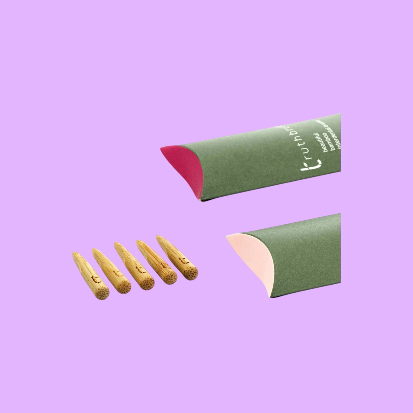 Truthbrush bamboo interdental brushes with five wooden handles and green cardboard packaging