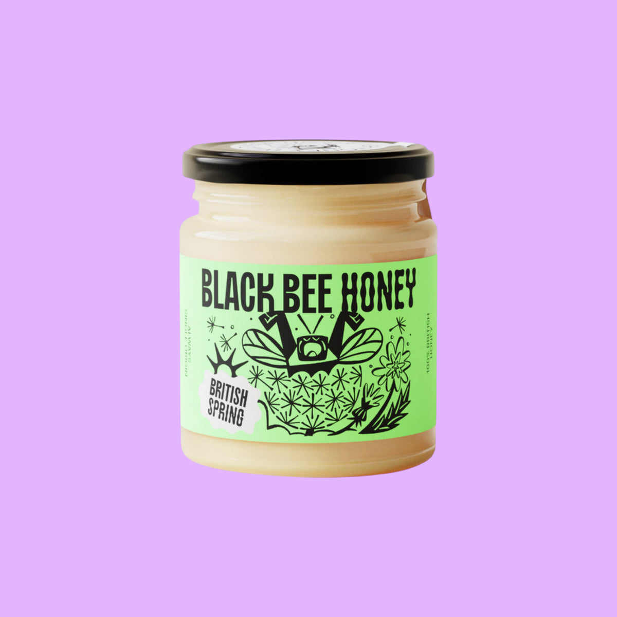 Black Bee Honey raw British spring soft-set honey in a glass jar with a light green label