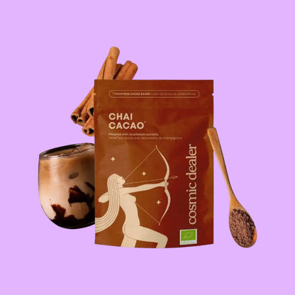 Cosmic Dealer Chai Cacao drinking chocolate sachet with mushroom extracts, cinnamon sticks, and a glass of iced chocolate (view 2).