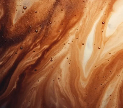 Close-up of Cosmic Dealer Chai Cacao drinking chocolate showing swirling dark brown cacao and creamy milk textures