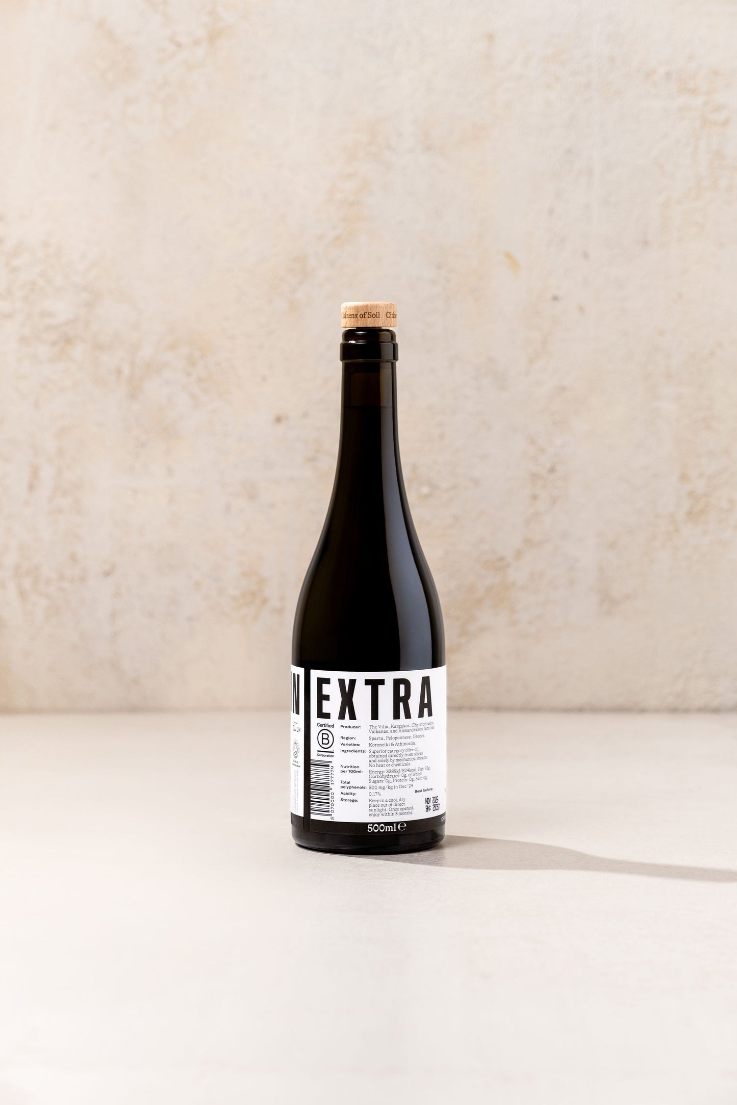 BRiMM Citizens of Soil organic Greek extra virgin olive oil in a dark glass bottle with a cork stopper