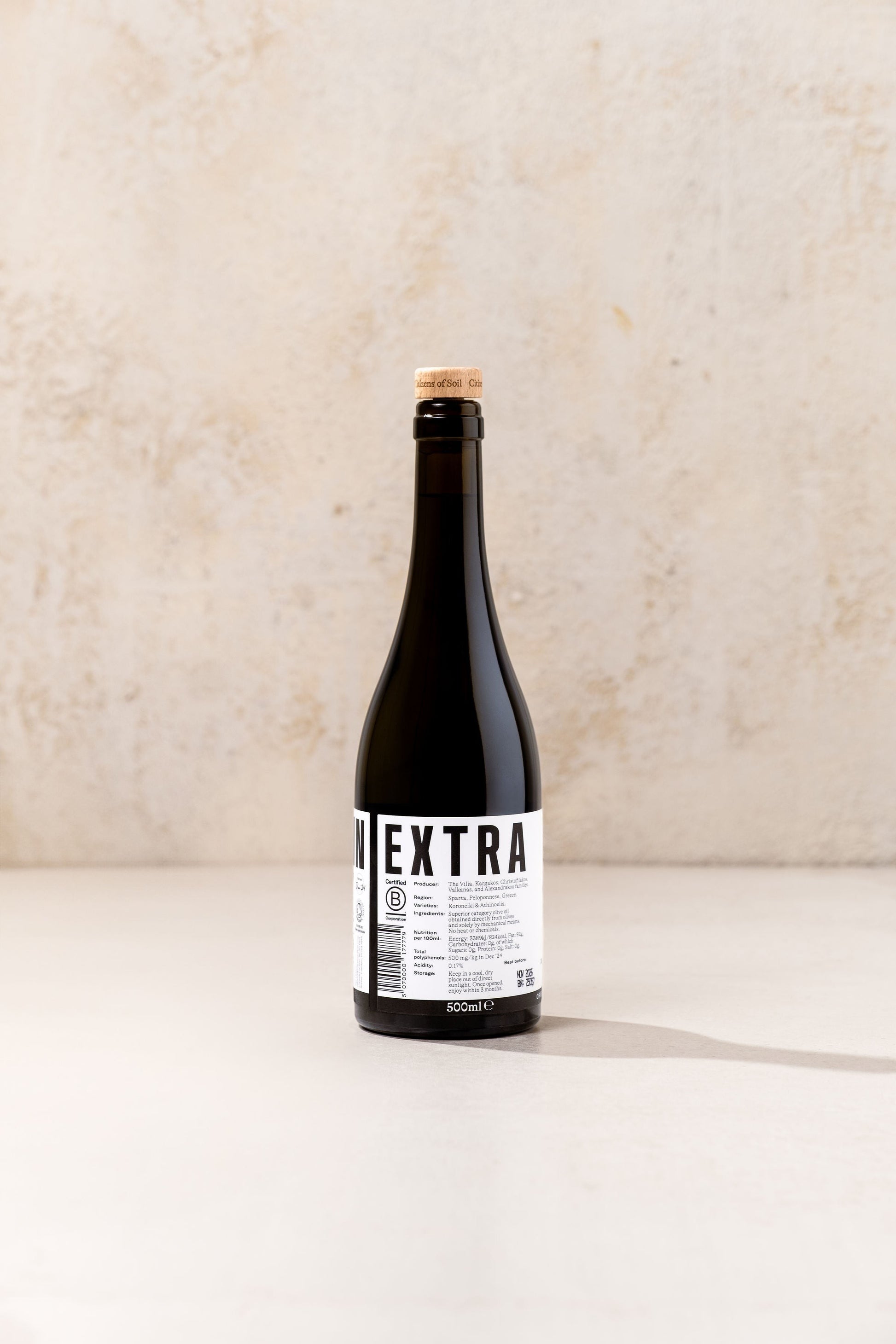 BRiMM Citizens of Soil organic Greek extra virgin olive oil in a dark glass bottle with a cork stopper