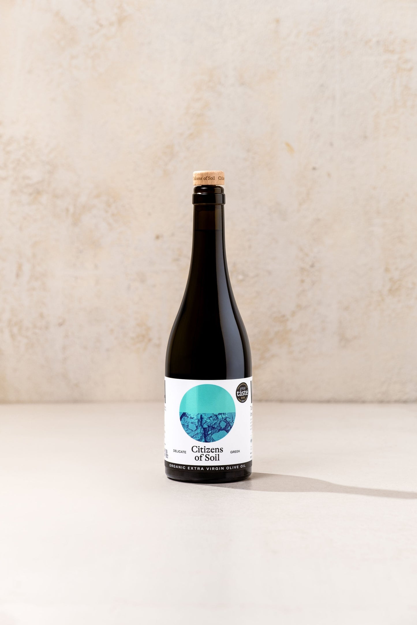 BRiMM Citizens of Soil organic Greek extra virgin olive oil in a dark glass bottle with a cork stopper
