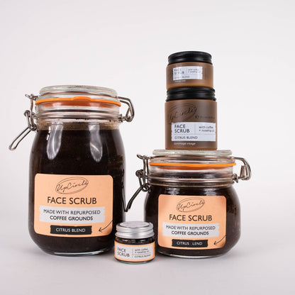UpCircle face scrub collection featuring coffee and rosehip oil in various glass jars with aluminium lids