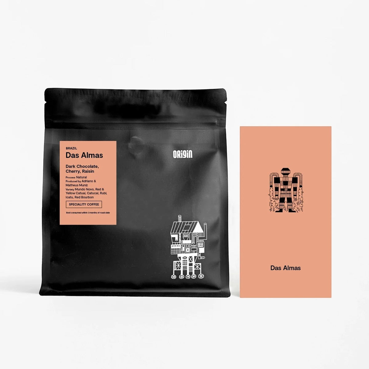 Origin Coffee Das Almas whole bean coffee bag with a peach-colored information card featuring a robot illustration.