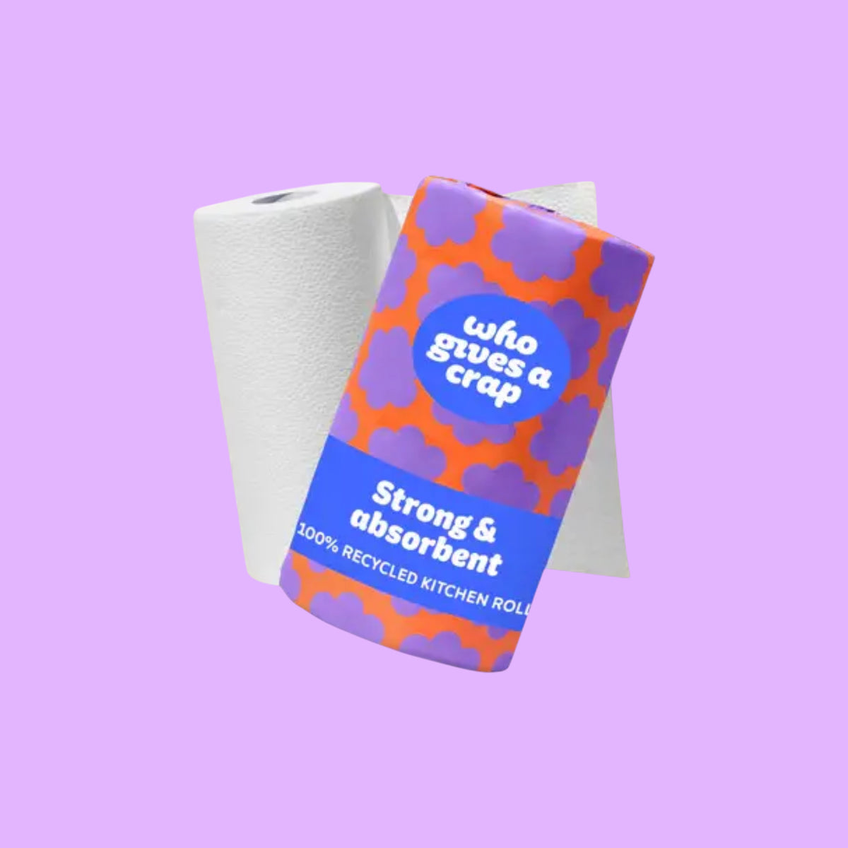 Who Gives A Crap double length 2-ply kitchen roll in orange and purple patterned paper wrapping, shown from a different angle.
