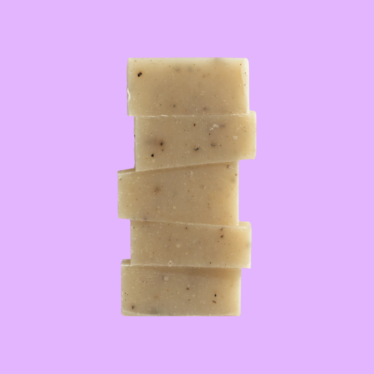 dulcie exfoliating seaweed soap block with natural wrack extract, aloe vera, and tea tree in a stacked slab design