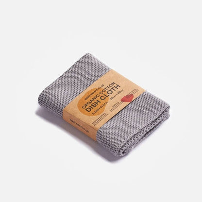 Zero Waste Club grey organic cotton dish cloth with a textured weave and cardboard belly band packaging