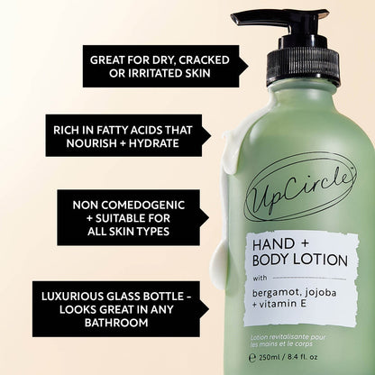 UpCircle Hand and Body Lotion in a frosted green glass bottle with a pump dispenser, featuring bergamot and vitamin E.