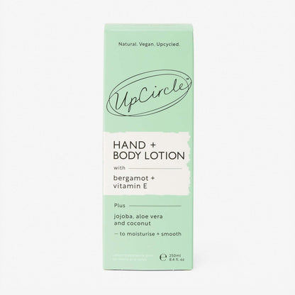 UpCircle hand and body lotion in a light green box with bergamot and vitamin E, featuring natural and upcycled ingredients.