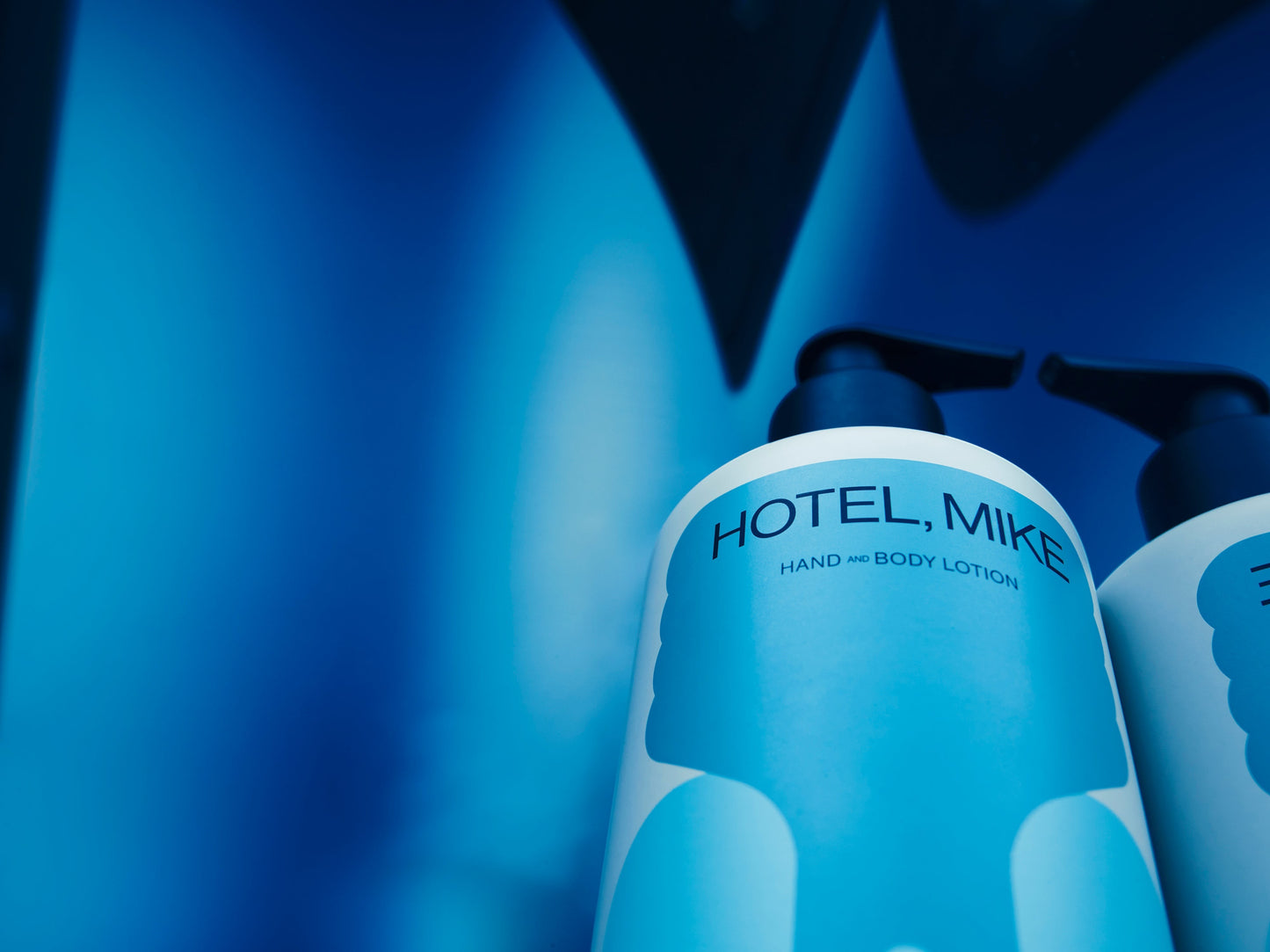 Hotel, Mike hand and body lotion in a sustainable aluminium bottle with a pump dispenser