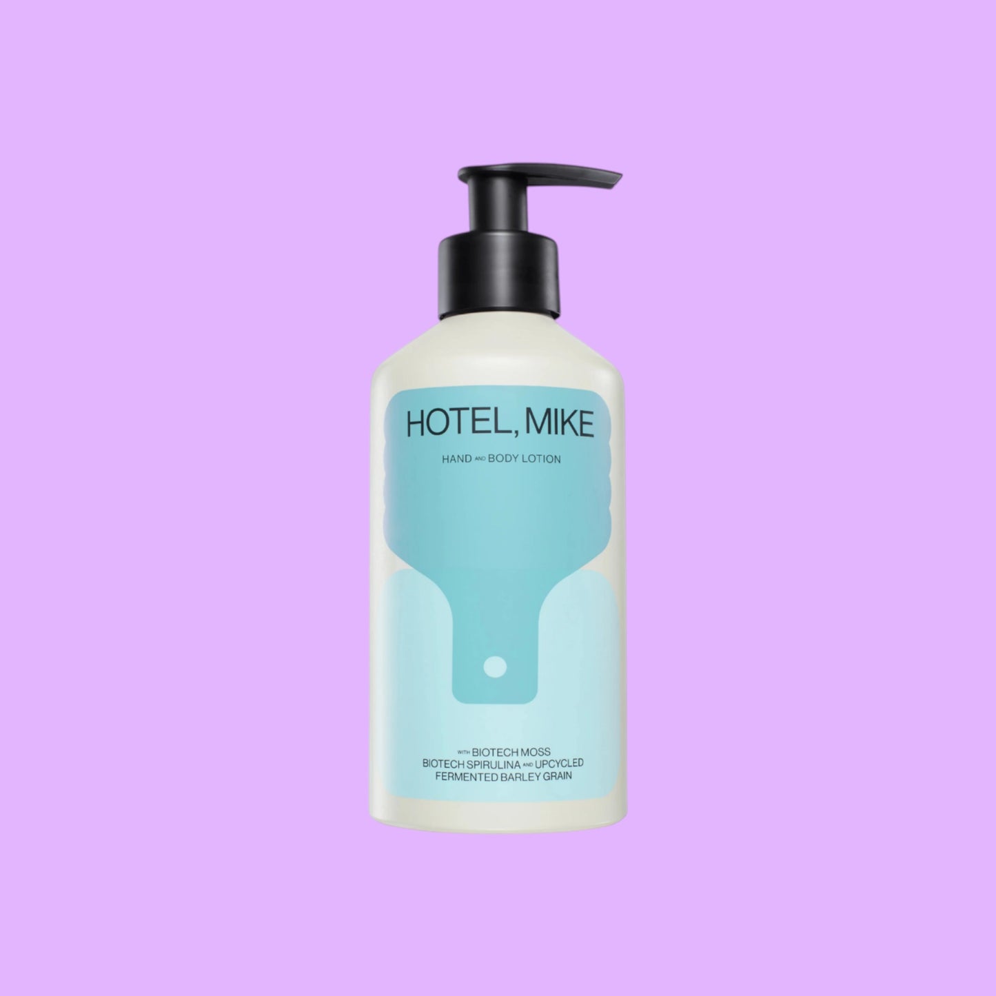 Hotel, Mike hand and body lotion in a sustainable aluminium bottle with a black pump dispenser, shown from a different angle.