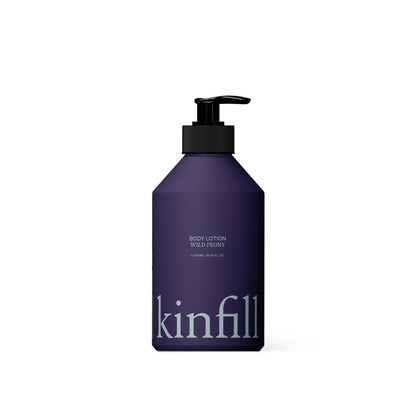 Kinfill refillable dark purple body lotion bottle with a black pump dispenser for sensitive skin care
