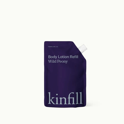 Kinfill Wild Peony body lotion refill pouch in deep purple packaging for sustainable skincare