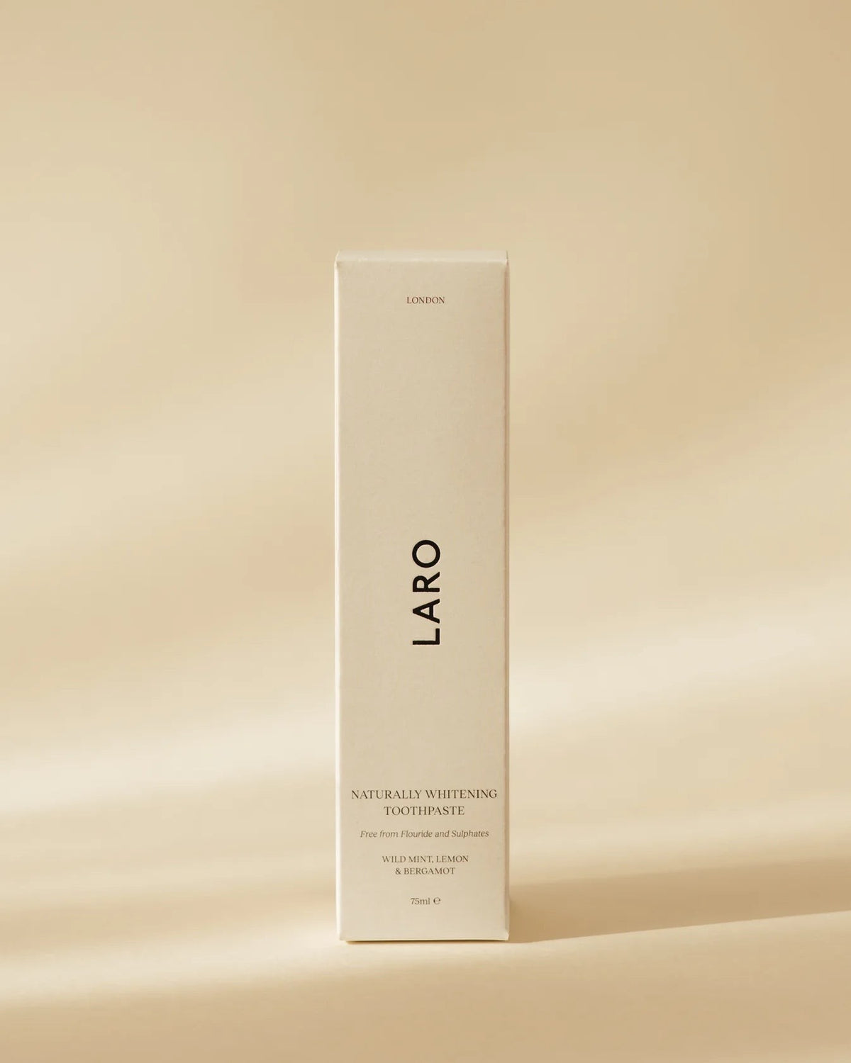 Laro London naturally whitening fluoride-free toothpaste in a beige recyclable aluminium tube.