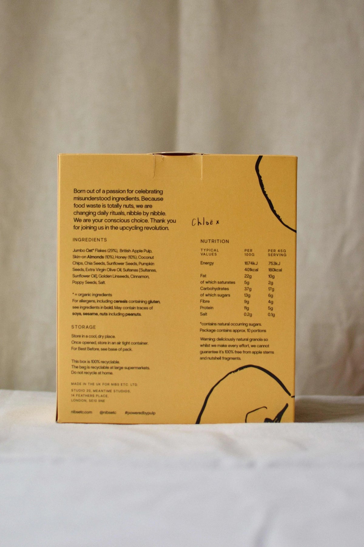 Nibs Etc. Oat, Almond & Honey Granola packaging back view showing ingredients and nutritional information