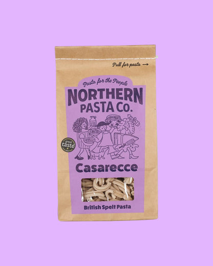 Northern Pasta Co. Casarecce in a brown paper bag with a purple label and clear window showing the pasta shape.