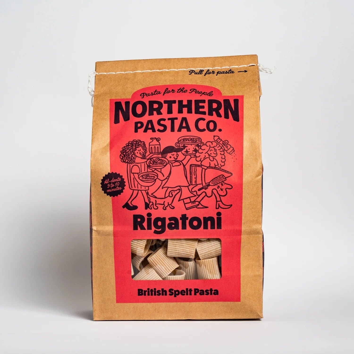 Northern Pasta Co. Rigatoni in a brown paper bag with red branding and a window showing the spelt pasta shapes (view 5).