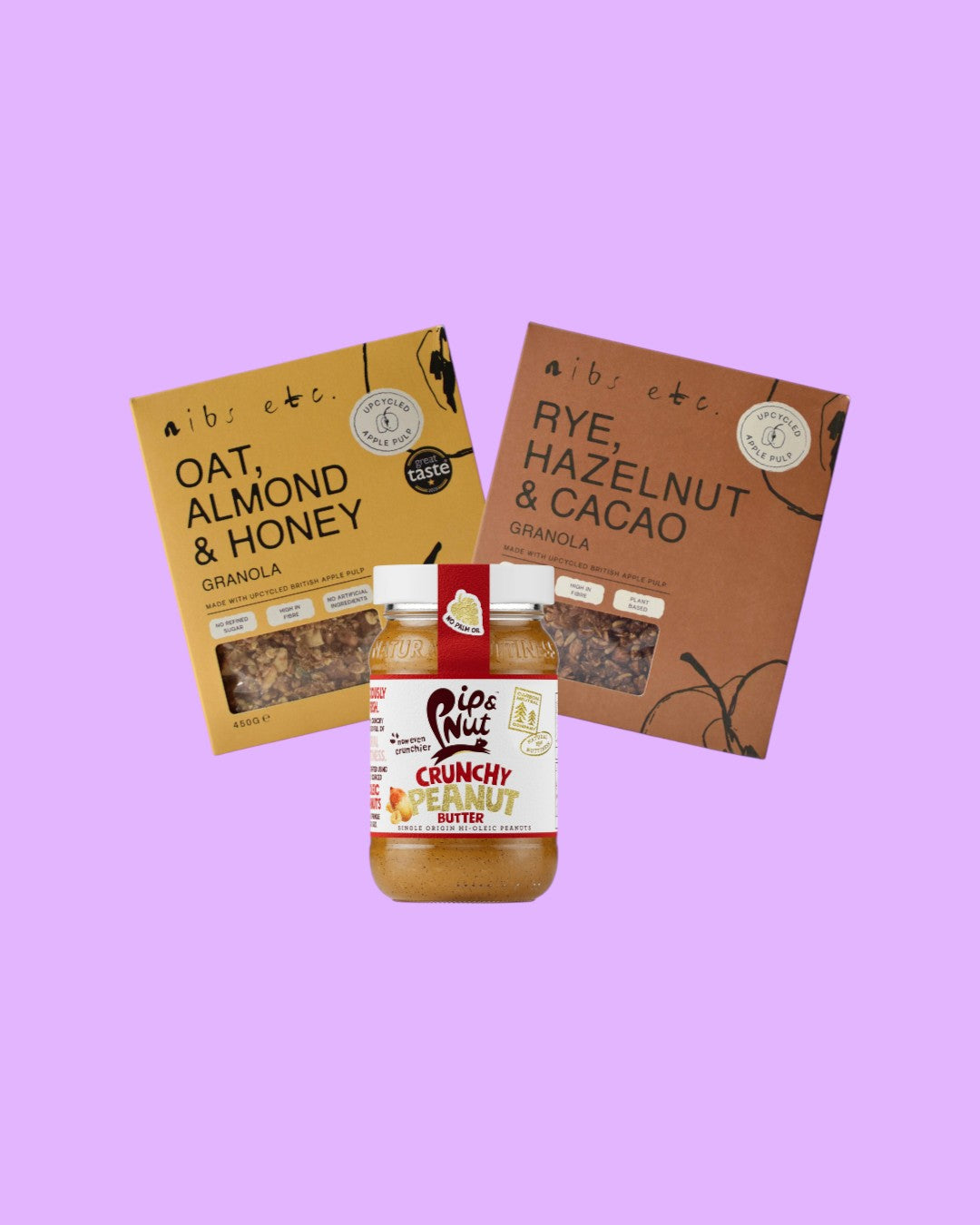 BRiMM breakfast set featuring Pip & Nut crunchy peanut butter and two Nibs etc. granola boxes on a neutral background.