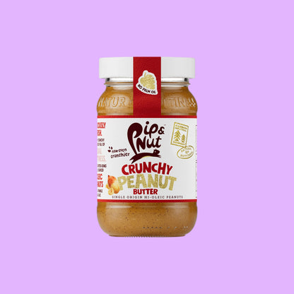 Pip & Nut crunchy peanut butter jar with red label, made from single-origin Argentinian hi-oleic peanuts, shown from a different angle.