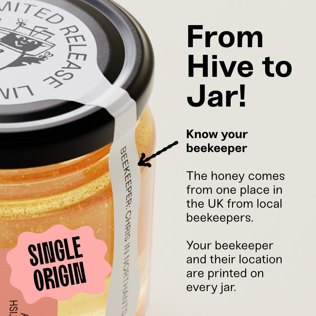 Black Bee Honey Raw Starflower Honey in a glass jar with a label identifying the beekeeper and single-origin UK source.