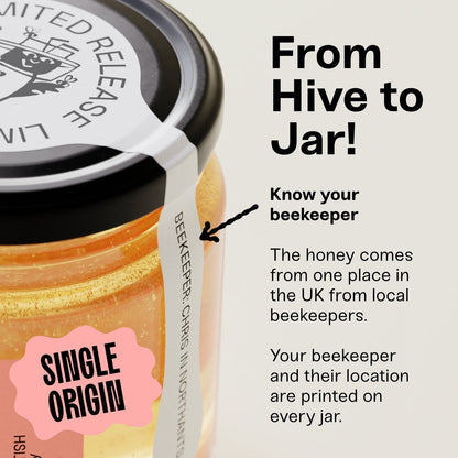 Black Bee Honey Raw Starflower Honey in a glass jar with a label identifying the beekeeper and single-origin UK source.