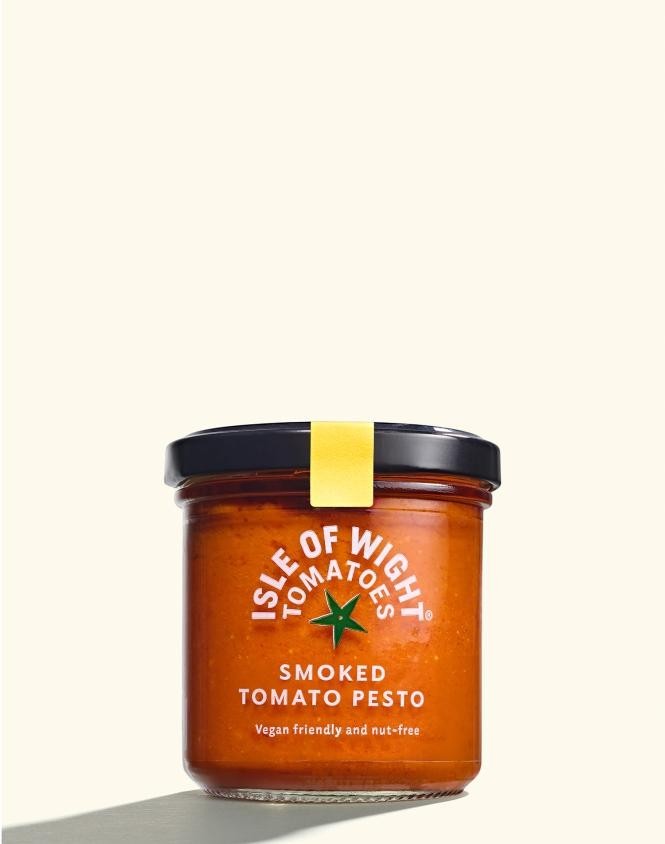 Isle of Wight Tomatoes Isle of Wight Smoked Tomato Pesto in a glass jar, a vegan and nut-free sauce made with roasted tomatoes.