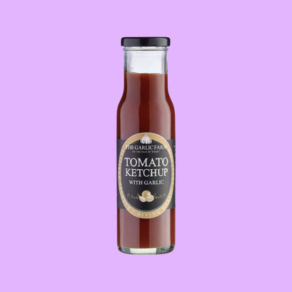 The Garlic Farm tomato ketchup with garlic in a glass bottle, a vegan and gluten-free condiment, shown from a different angle.