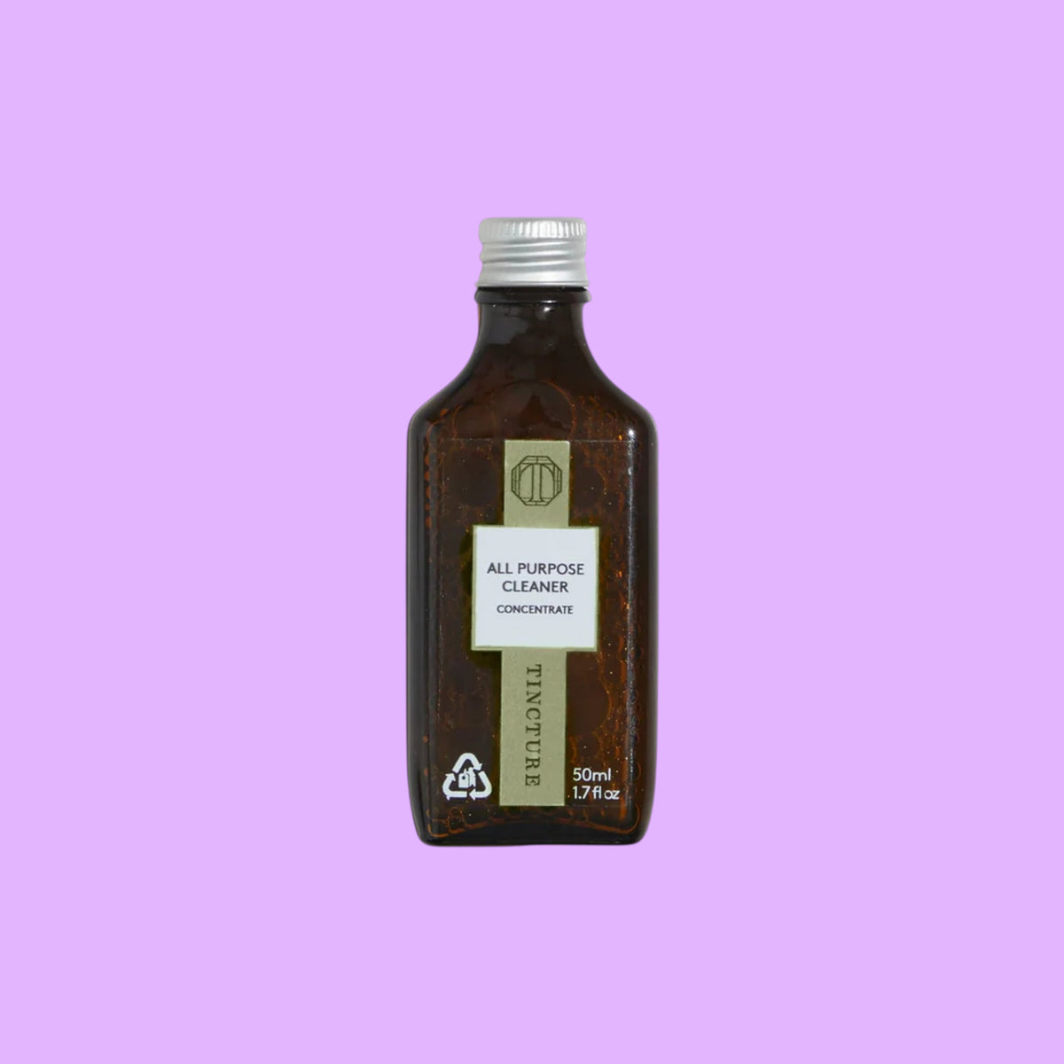 Tincture London 50ml all purpose cleaning concentrate refill in a small amber glass bottle with silver cap (view 2).
