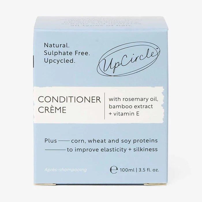 UpCircle natural hair conditioner crème in a light blue box with rosemary oil and bamboo extract