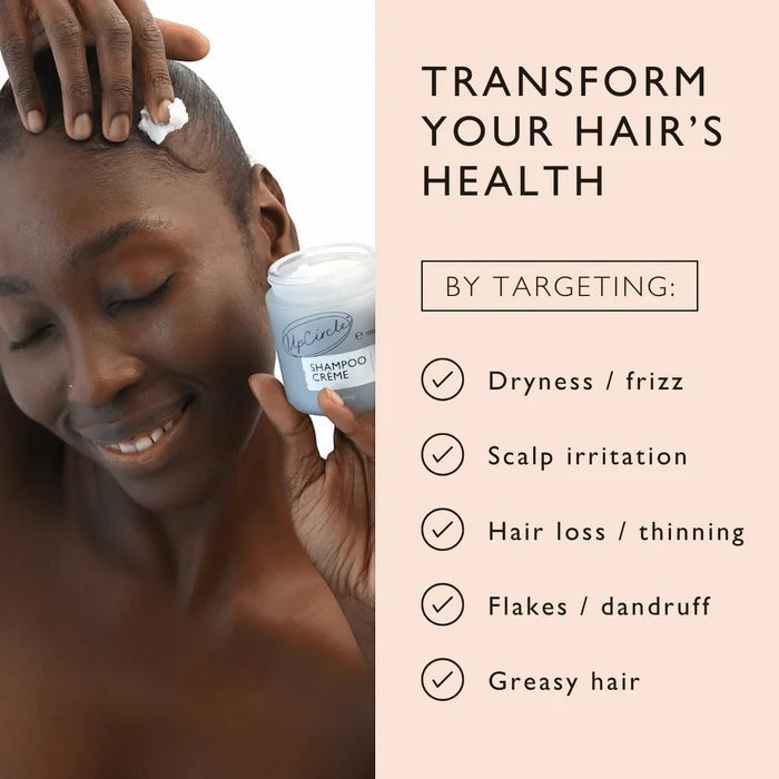 UpCircle refillable shampoo crème being applied by a woman to improve hair health and target scalp concerns.