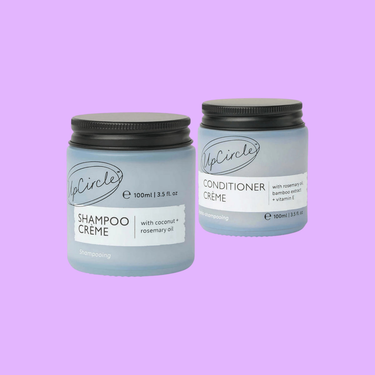 UpCircle shampoo and conditioner crème duo in frosted glass jars with black lids for hair nourishment.
