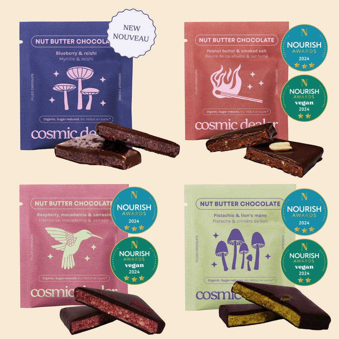 Cosmic Dealer gift box featuring four assorted nut butter chocolate bars with colourful illustrated packaging.
