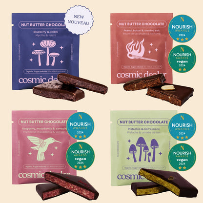 Cosmic Dealer gift box featuring four assorted nut butter chocolate bars with colourful illustrated packaging.
