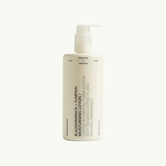dulcie Bladderwrack and Pumpkin Moisturising Lotion in a minimalist white pump bottle with botanical ingredients.